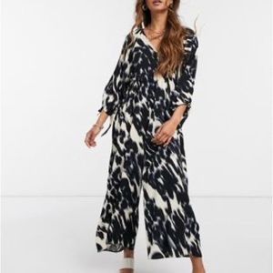 ASOS smock jumpsuit with tie sleeve detail in blurred animal print